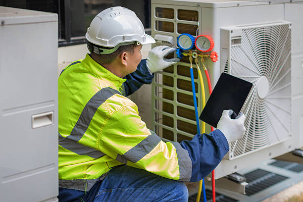 Professional Air Duct Cleaning technician working in Cologne, NJ